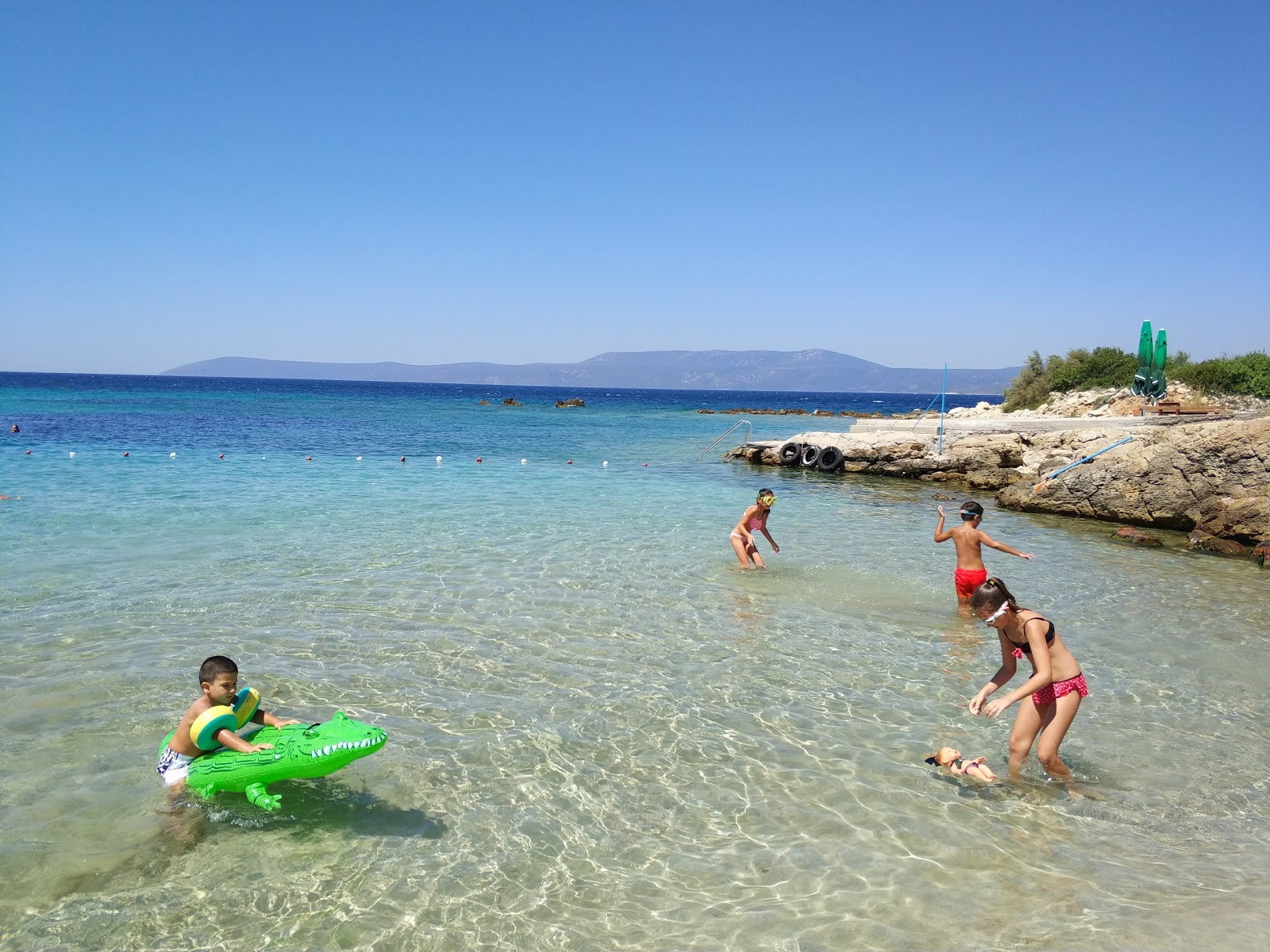 Φωτογραφία του Kucuk Beach με επίπεδο καθαριότητας πολύ καθαρό