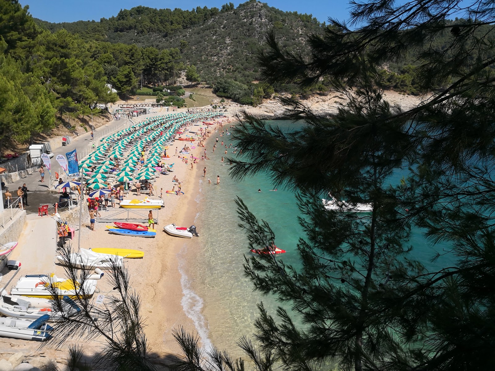 Photo of Pugnochiuso Beach with turquoise pure water surface