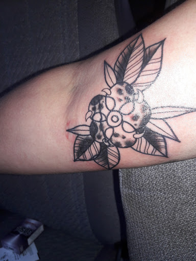 Explore tattoo ideas for womens feet, creative tattoo ideas in Lakeland, available at Black Swan Tattoo