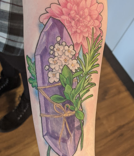 Find angel tattoo ideas for ladies for your next unique tattoo in Fargo at Tailwind Tattoo