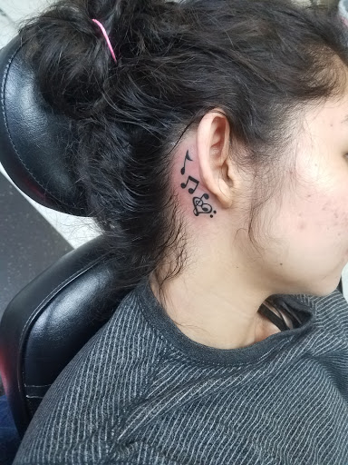 Explore spanish tattoo ideas, creative tattoo ideas in Libertyville, available at Art With Atattooed