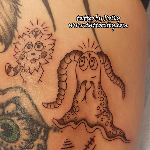 Explore forearm watercolor tattoo ideas, creative tattoo ideas in Lockport, available at Tattoo City by Larry Brogan