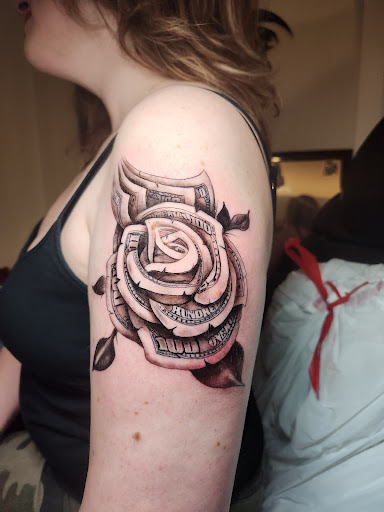 Explore toothless tattoo ideas, creative tattoo ideas in Cranston, available at Powerline Tattoo