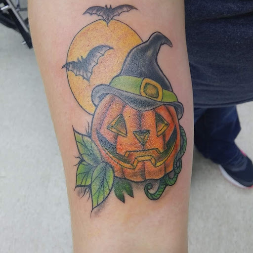 Explore mens knee tattoo ideas, creative tattoo ideas in Calhoun, available at A Sailors Grave Tattoo Parlor