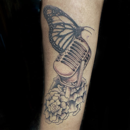 Explore simple horse tattoo ideas, creative tattoo ideas in Topeka, available at Looking Glass Tattoo & Gallery