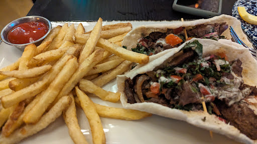 This was the Beef Shawarma, in a slightly unexpected presentation.  Tasty, got messy trying to eat handheld with that pita tortilla not holding up.  Ended up forking the bits and then eating the rest.  Really nicely done fries.