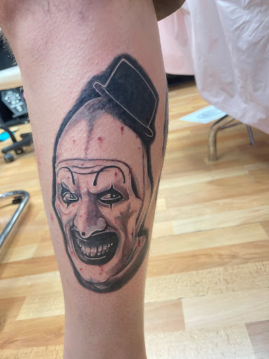 Explore arch angel tattoo ideas, creative tattoo ideas in Benton, available at Spectrum Tattoo