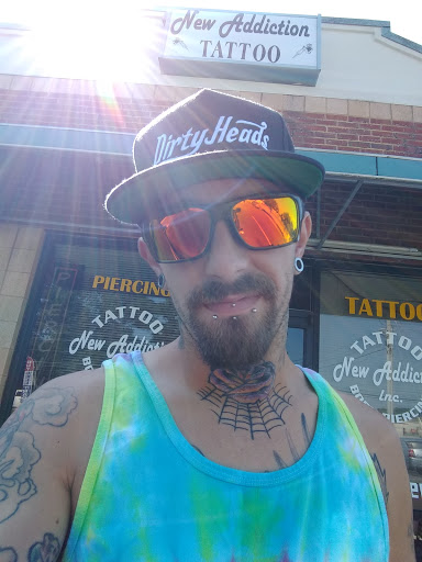 Explore dolphin tattoo ideas, creative tattoo ideas in Wilson, available at New Addiction Tattoos