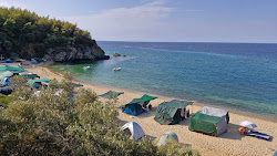 Secret Paradise Beach'in fotoğrafı düz bir kıyı şeridi ile birlikte