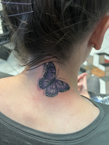 Find earth tattoo ideas for your next unique tattoo in Englewood at Phantom 8 Tattoo & Piercing