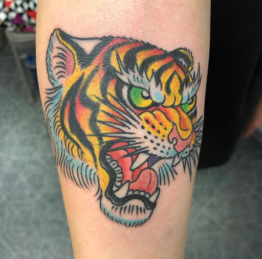 Explore atom tattoo ideas, creative tattoo ideas in Harrisonburg, available at Alley Cat Tattoo