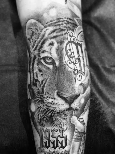 Explore alpha omega tattoo ideas, creative tattoo ideas in Fountain Valley, available at Lowrider Tattoo Studios