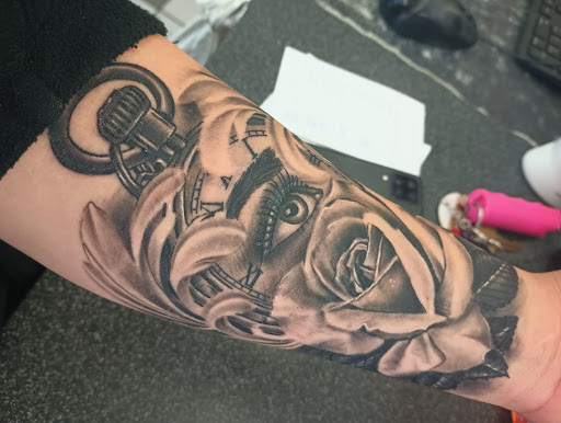 Explore flower tattoo ideas on arm, creative tattoo ideas in Glenwood Springs, available at Spyder Rose Tattoo