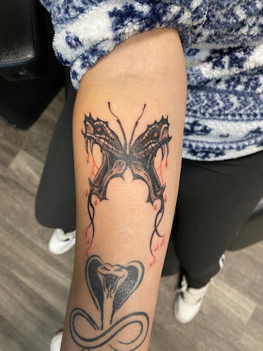 Explore dominican tattoo ideas, creative tattoo ideas in Denver, available at Viva La Raza Tattoo Club