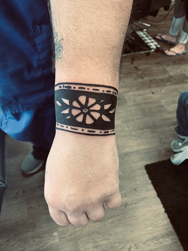 Explore sibling tattoo ideas for 2, creative tattoo ideas in Lake City, available at Crooked Spines Tattoo Studio