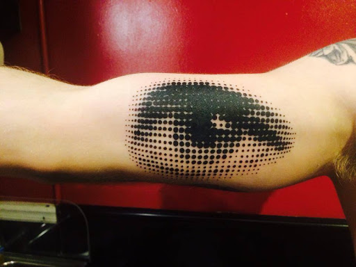 Explore book lovers tattoo ideas, creative tattoo ideas in Powell, available at Against All Odds Tattoos and Piercings