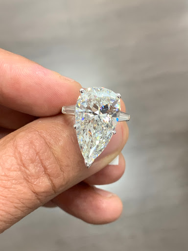Aziz Diamonds | Rolex & Jewelry Buyers