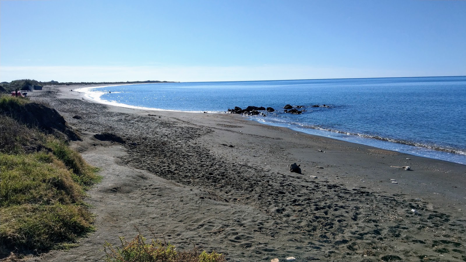 Foto von Sabbie Nere St Severa mit langer gerader strand