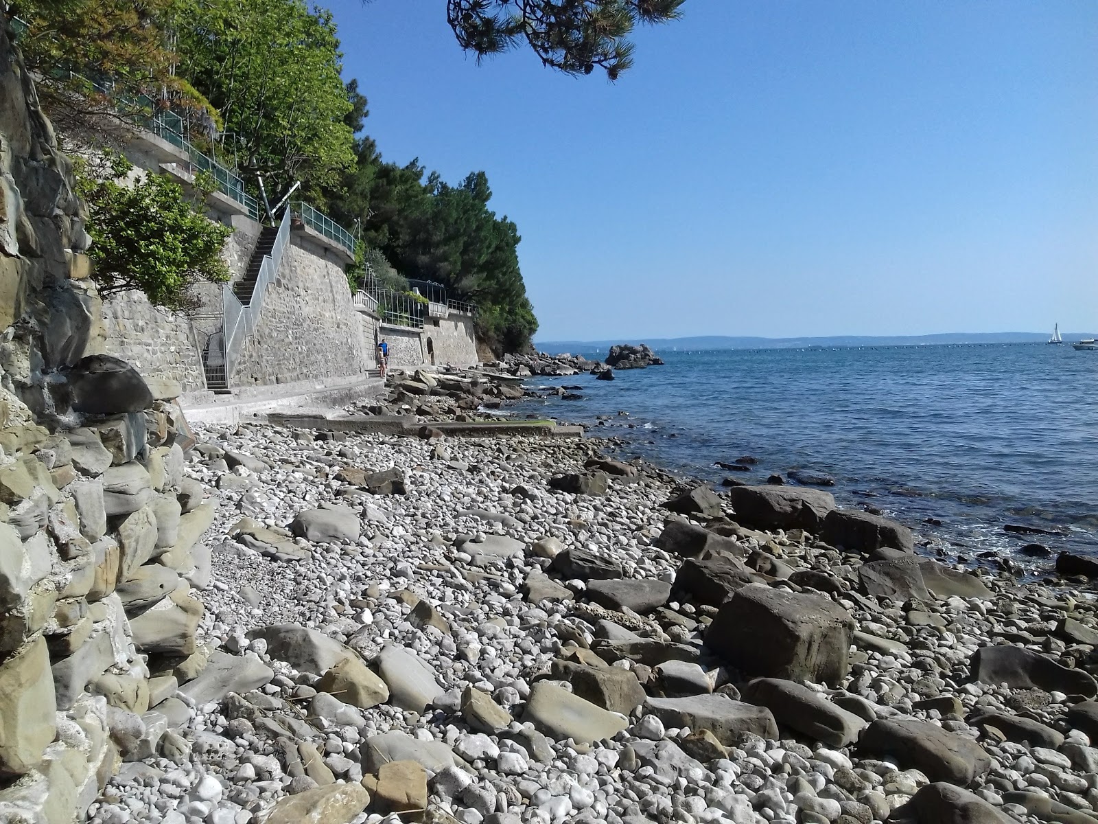 Foto van Spiaggia Liburnia met blauw puur water oppervlakte