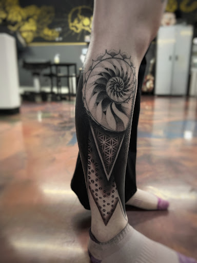 Explore feminine leg tattoo ideas, creative tattoo ideas in Anchorage, available at Ultra Violence Tattoo co.