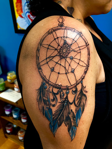 Explore traditional tattoo sleeve ideas, creative tattoo ideas in Covington, available at Cupid Slave Tattoo Company