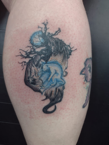 Explore small dog tattoo ideas, creative tattoo ideas in Cadillac, available at Warchief Tattoo, LLC