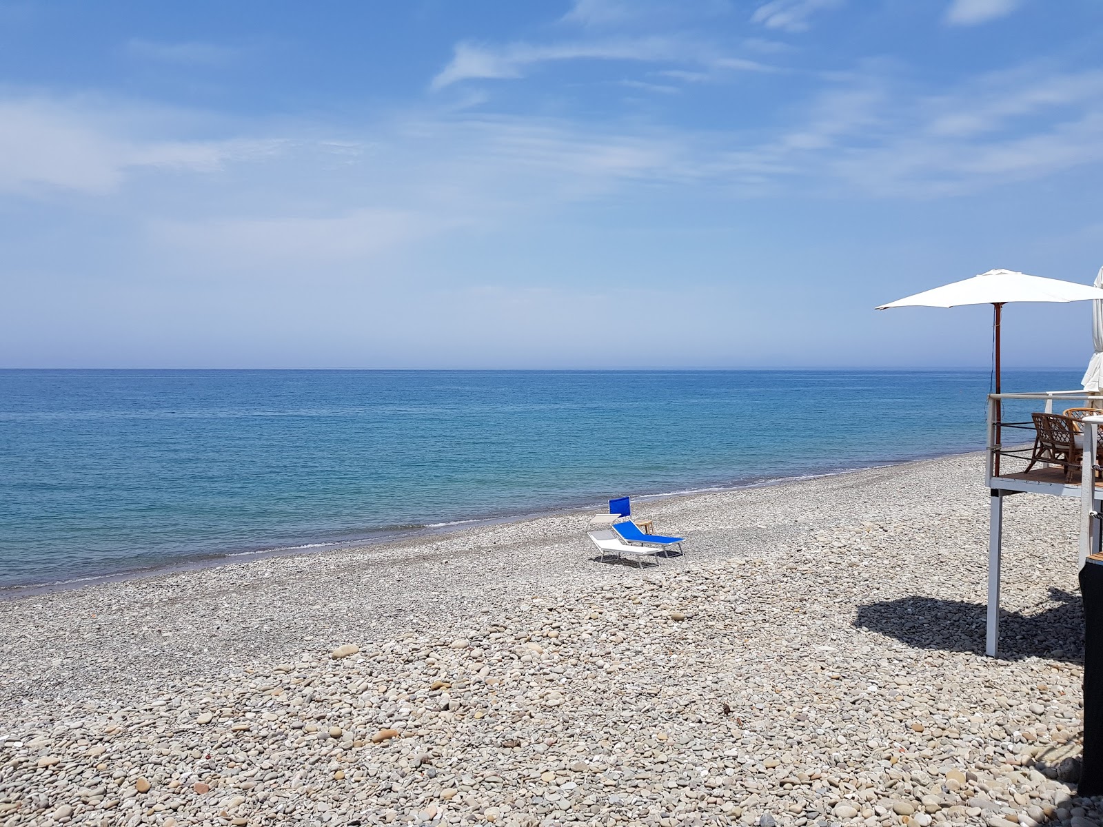 Foto av Sant'Agata di Militello II med turkos rent vatten yta