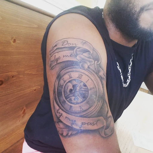 Explore thug tattoo ideas, creative tattoo ideas in Smithfield, available at Combine Mindz Tattoo Production LLC