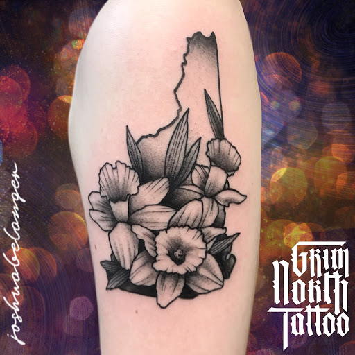 Explore black flower tattoo ideas, creative tattoo ideas in Portsmouth, available at Grim North Tattoo and Piercing