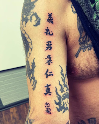 Explore owl tattoo ideas for females, creative tattoo ideas in Warren, available at Aces Tattoo & Body Piercing