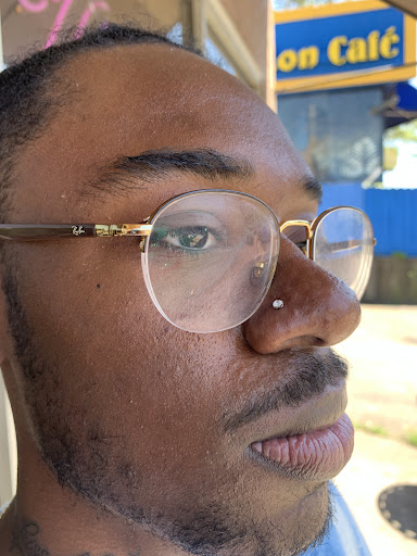 Explore spine tattoo ideas for men, creative tattoo ideas in Atlanta, available at Virtue and Vice Body Piercing