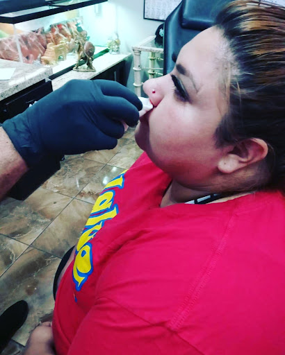 Explore orchid tattoo ideas, creative tattoo ideas in Phoenix, available at Mannys Tattoo Shop