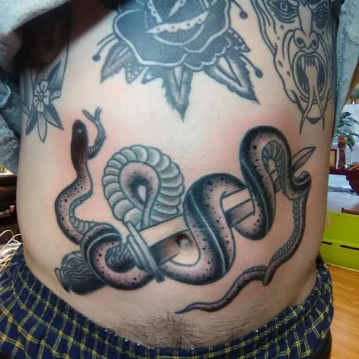 Explore clock tattoo ideas for guys, creative tattoo ideas in Chicago, available at Mind Crusher Tattoo