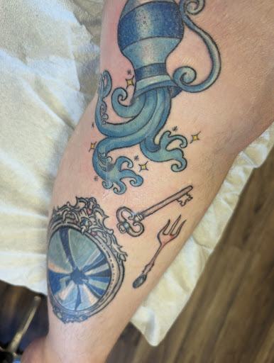 Find book of tattoo ideas for your next unique tattoo in Greenfield Center at Apothecary Ink