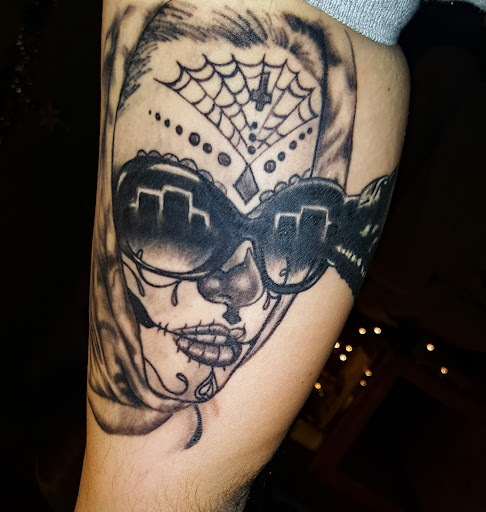 Explore clown tattoo ideas, creative tattoo ideas in Rogers, available at Ink Solutions Tattoo