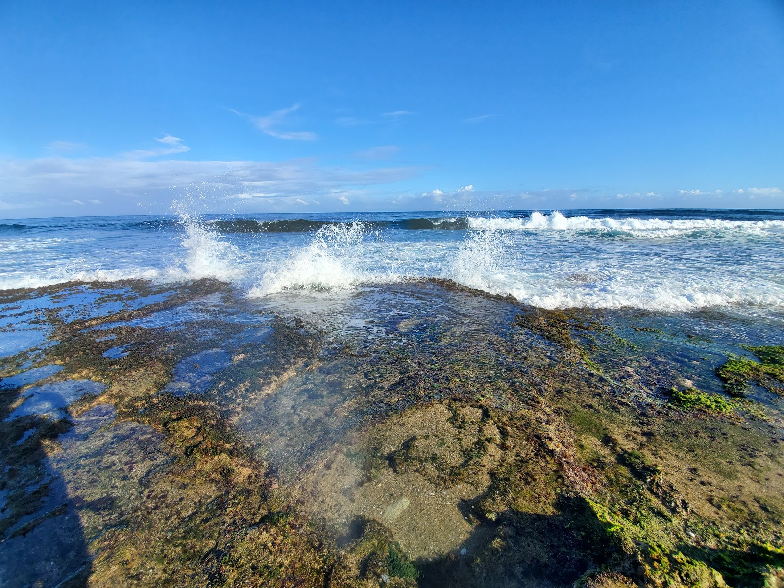 Zdjęcie Los Almendros beach z powierzchnią niebieska woda