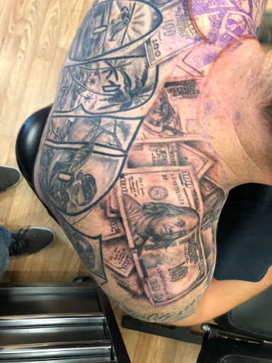 Explore black tattoo cover up ideas, creative tattoo ideas in Sarasota, available at SEVEN SINS Tattoo Studio