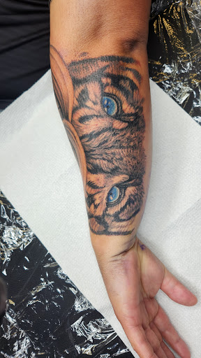 Explore belle tattoo ideas, creative tattoo ideas in Stuart, available at Tiger Shark Tattoo Studio
