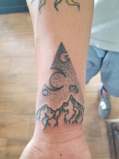 Explore cherry blossom tattoo ideas, creative tattoo ideas in Santa Fe, available at Rivers Collective Body Art