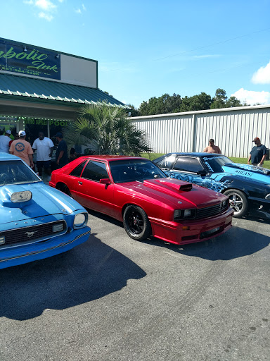 Explore flower tattoo ideas on arm, creative tattoo ideas in Foley, available at Symbolic Ink Tattoo Studio