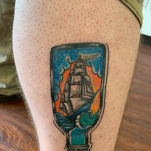 Explore surfboard tattoo ideas, creative tattoo ideas in Seymour, available at American Gypsy Tattoo Corp.