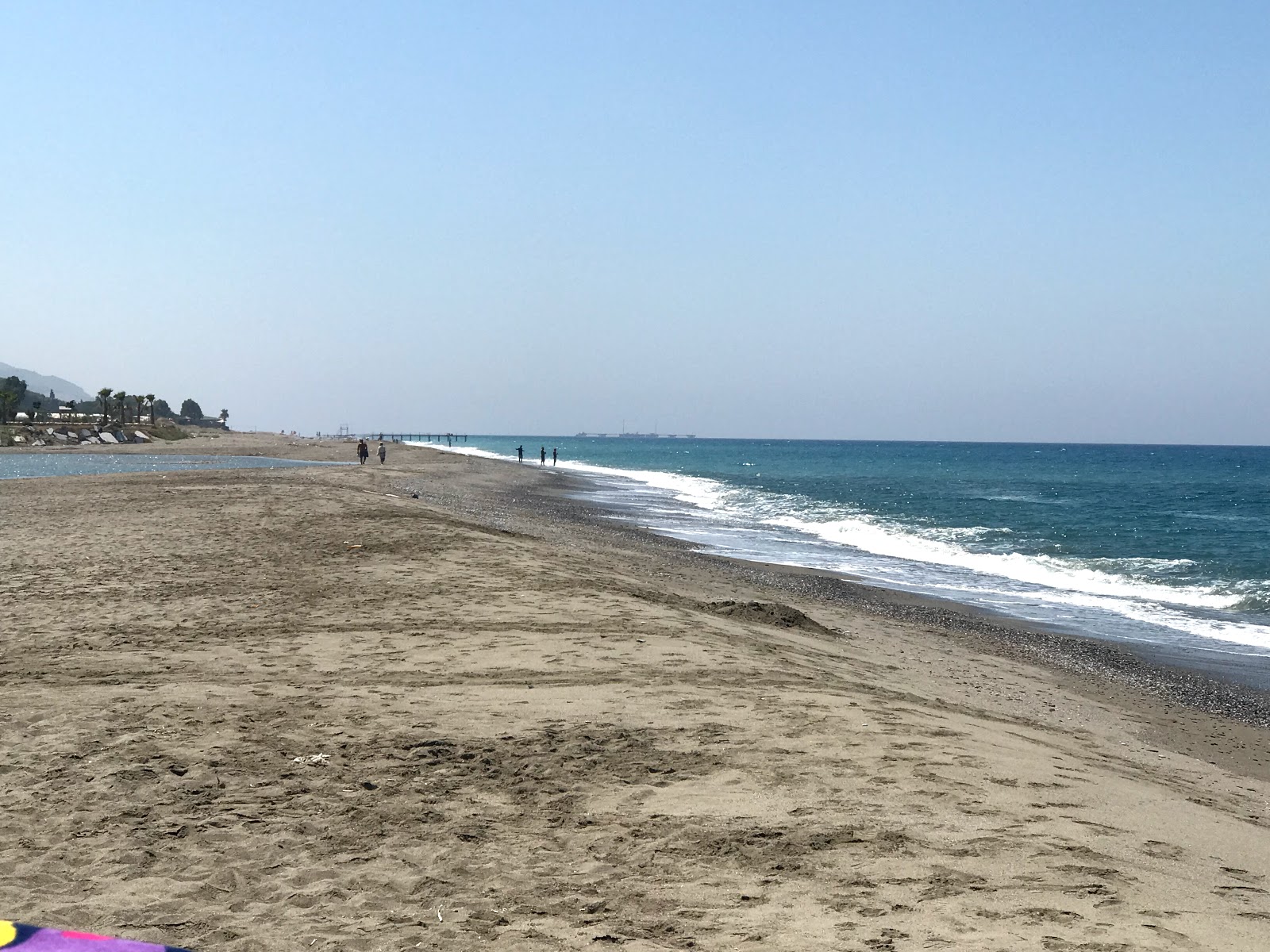 Foto av Demirtas beach med lång rak strand