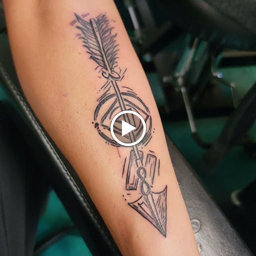 Explore motorbike tattoo ideas, creative tattoo ideas in Traverse City, available at Pinups & Needles