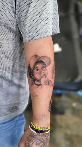 Explore ideas for initial tattoos, creative tattoo ideas in Stockton, available at Tatt Me Up Studio