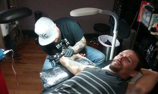 Tattoo Shop «Moth Studio», reviews and photos, 428 W Commercial St, Springfield, MO 65803, USA