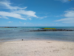 Foto di Alula beach con baia piccola
