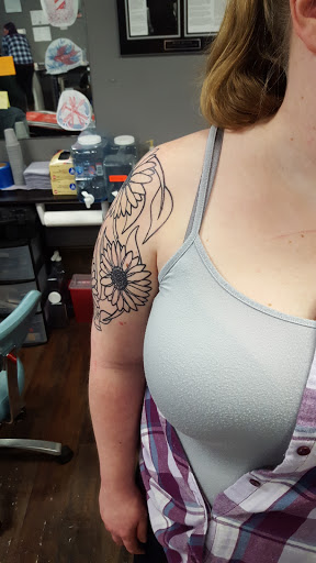 Explore feminine hand tattoo ideas, creative tattoo ideas in Hendersonville, available at Endless Kreations Custom Tattoo & Piercing LLC
