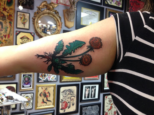 Explore golden retriever tattoo ideas, creative tattoo ideas in Cranston, available at Ambition Tattoo Studio