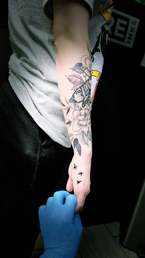 Explore half chest tattoos for men ideas, creative tattoo ideas in Cadillac, available at Limitless Ink Tattoo Studio