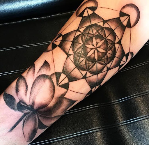 Explore locket tattoo ideas, creative tattoo ideas in San Diego, available at Sideshow Tattoo and Piercing